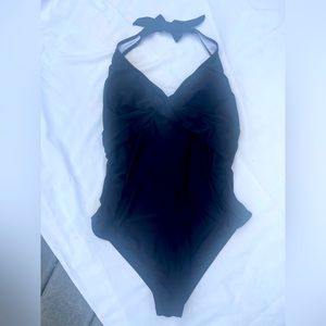 Black maternity one piece swimsuit. Cross cross bust detail.